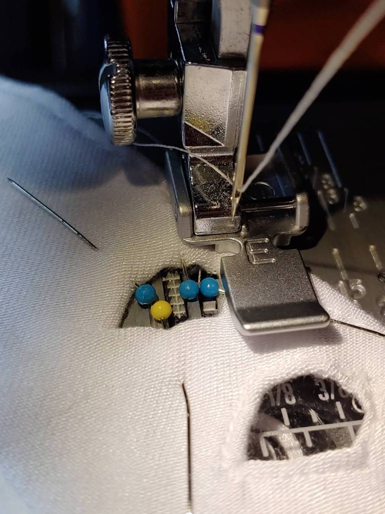 Carefully sewing the cutout using a zipper foot