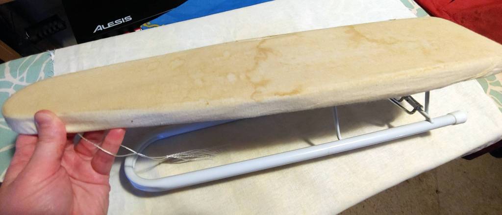 A sleeve board looks kind of like a mini ironing board