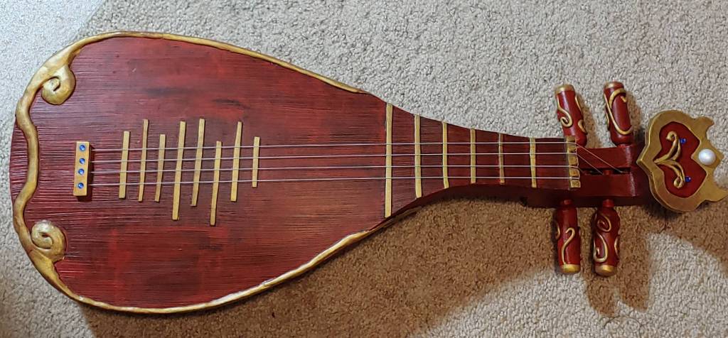 A weathered Chinese lute that fooled people into believing it was wood at the con