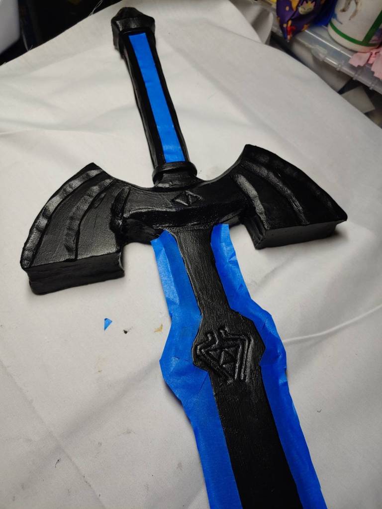 Blocking off sections that aren't going to be painted with blue painter's tape