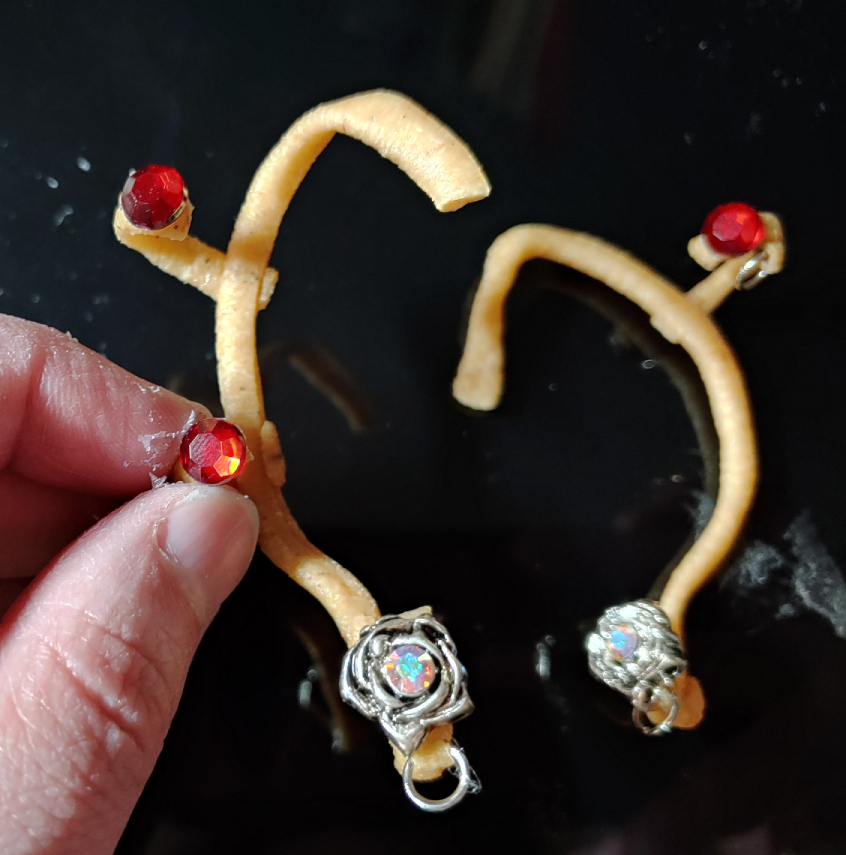 rhinestones and flower gems added to the earrings