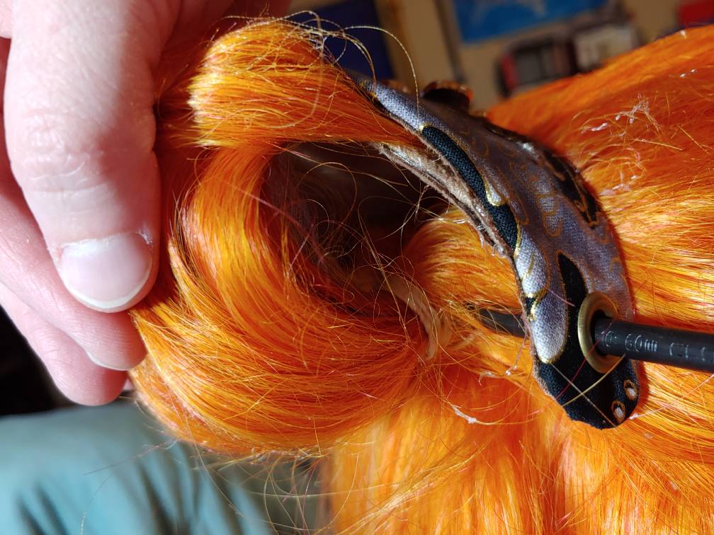 The hairstick added to support the ornament