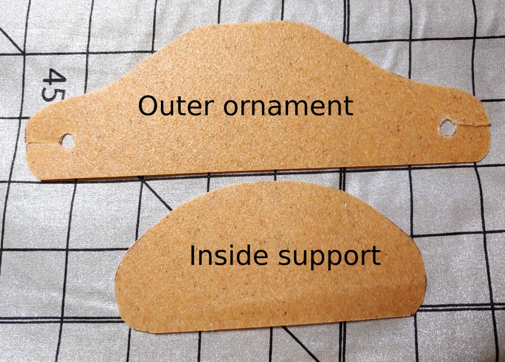 Cutting the worbla pieces. Two pieces form the ornament to give it support