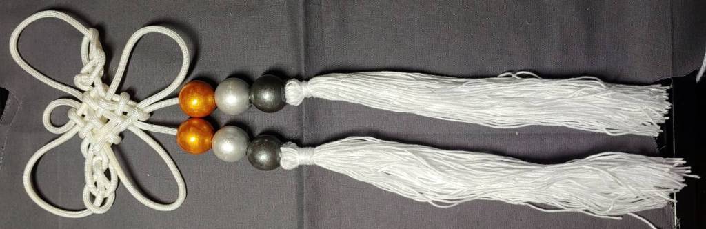 Massive tassels nearly a foot long made of embroidery floss