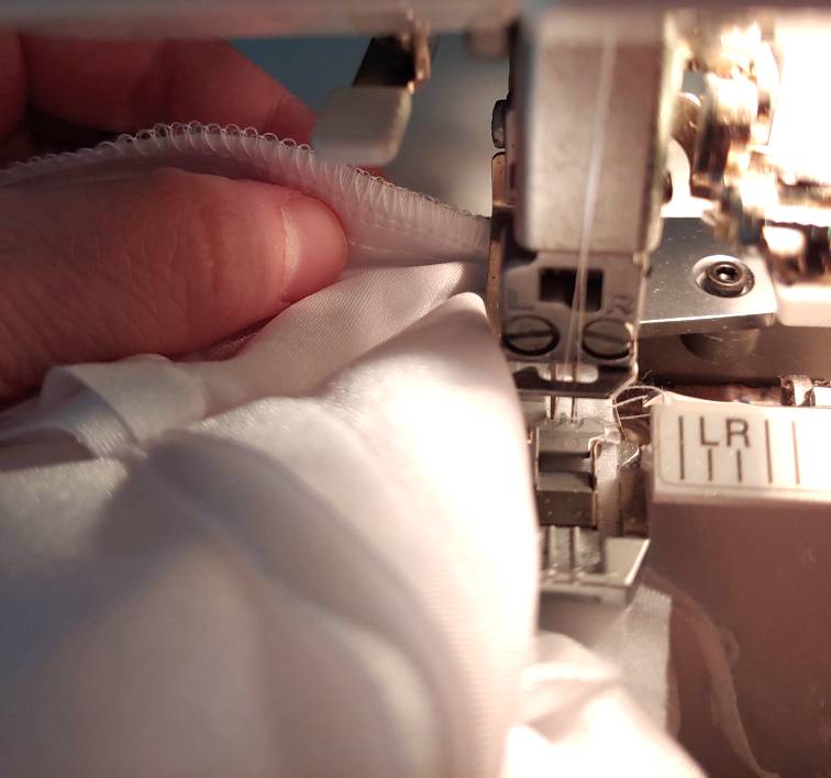 Serging the seams to make them stretchy