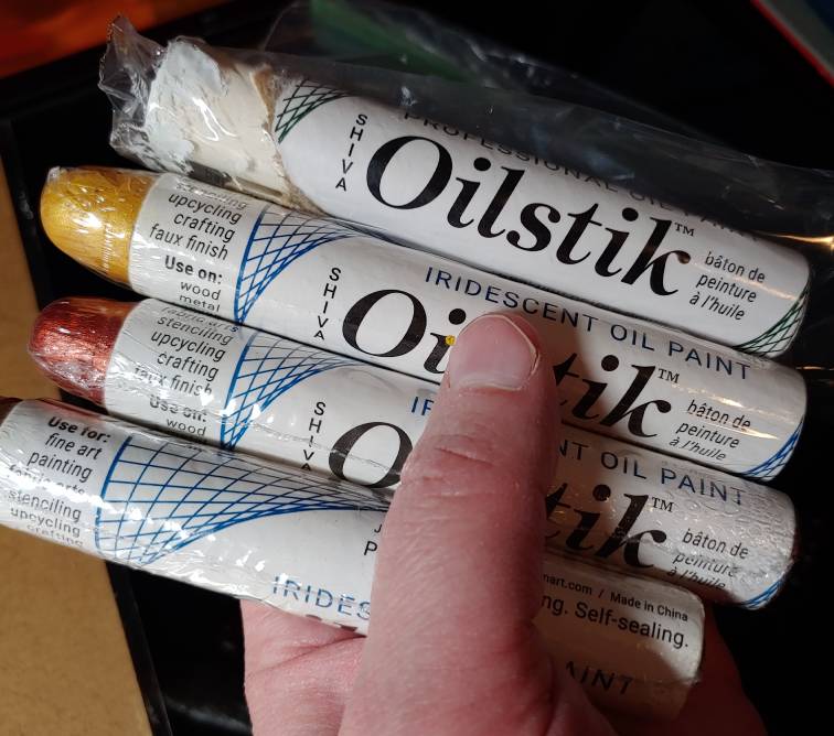 A collection of iridescent Paintstiks