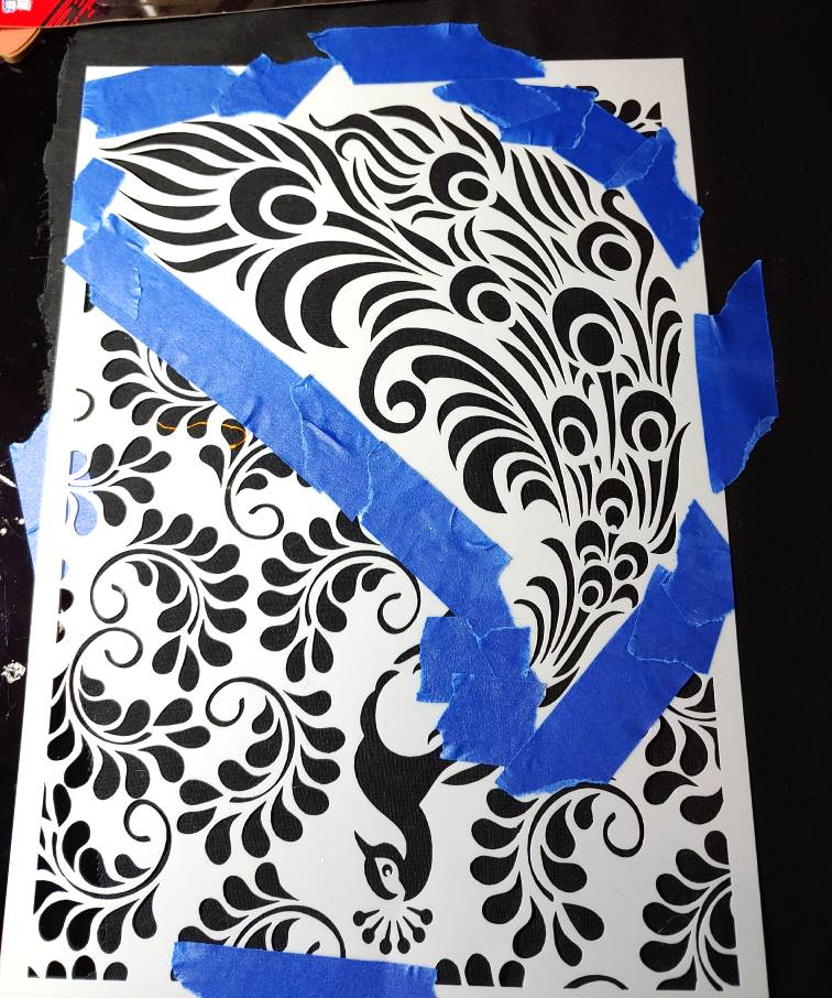 Masking, or sectioning off, parts of the stencil that will not be used