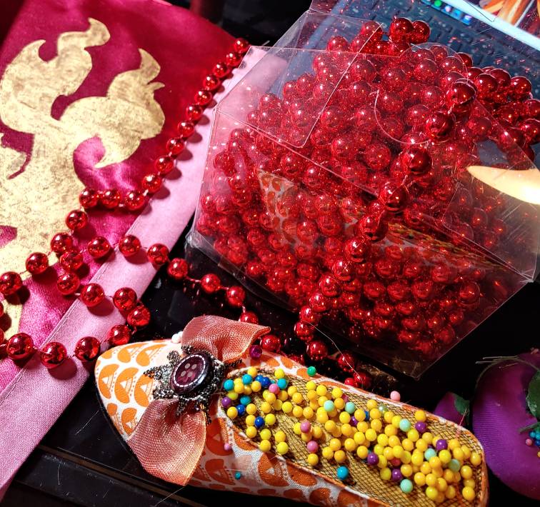 Checking the placement of the beads by laying them down on the fabric