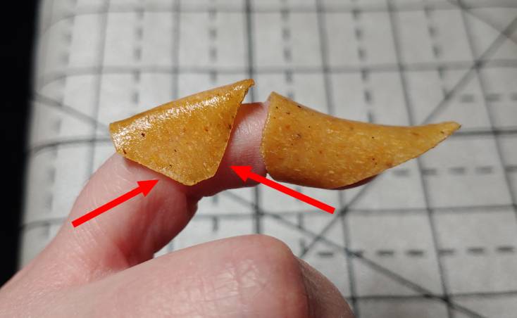 Finger cap with movement hindrance points marked