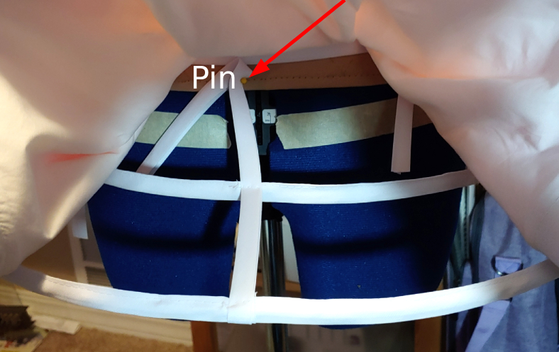 Pinning the hoop to the basque