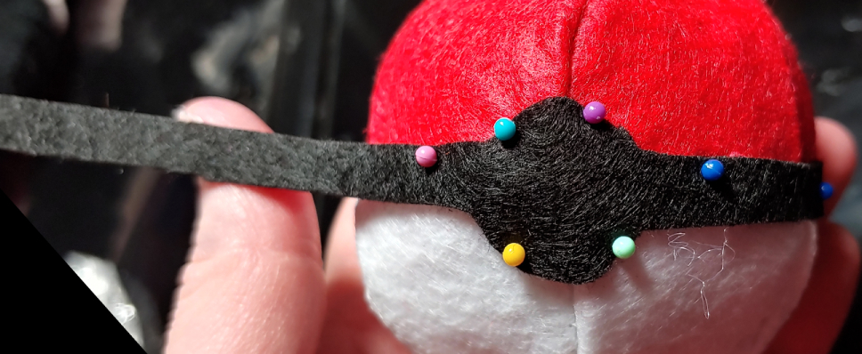 The center decoration, glued and pinned.