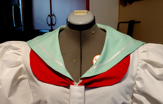 Finished mint green sailor collar with a single white stripe