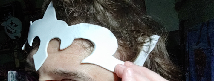 Press the crown against your forehead, holding it at the side, and wait until it cools