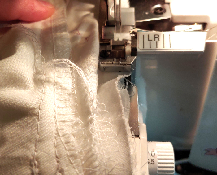 Finishing and sealing the edge with a serger to prevent scratchiness