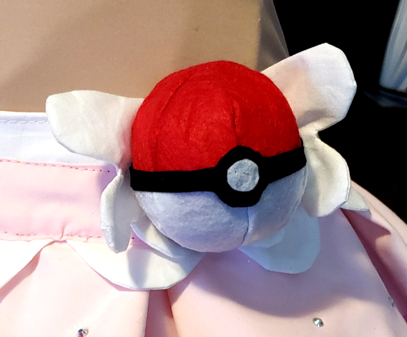 Pokeball with white fabric backing on a skirt
