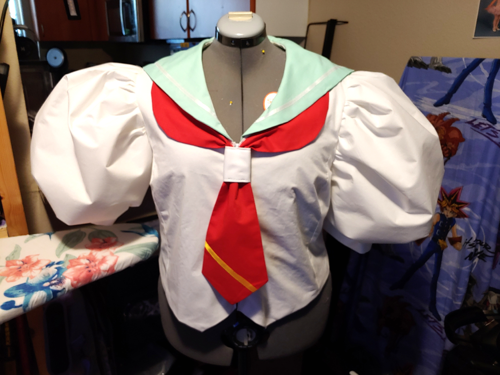 Ohtori Academy uniform from Utena. The body is made from a dress shirt while the rest of the pieces are customized.