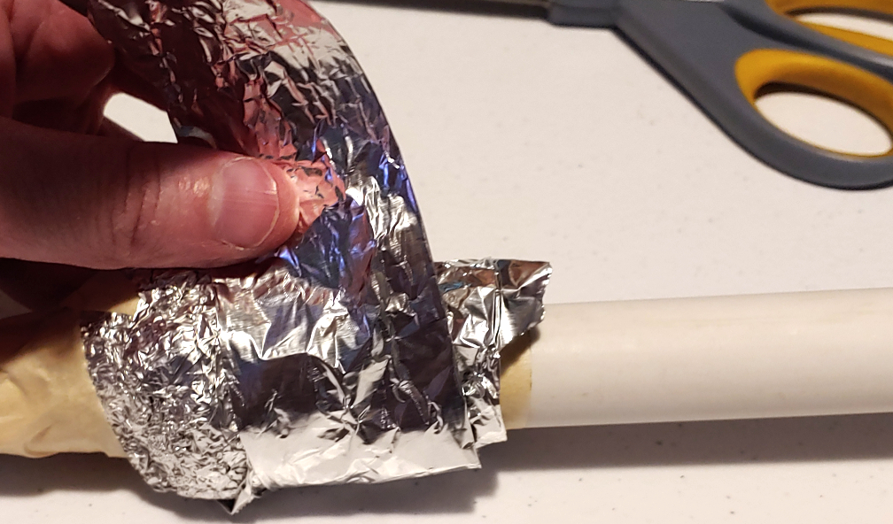 Wrapping a flat piece of foil over the knot can help with smoothness.