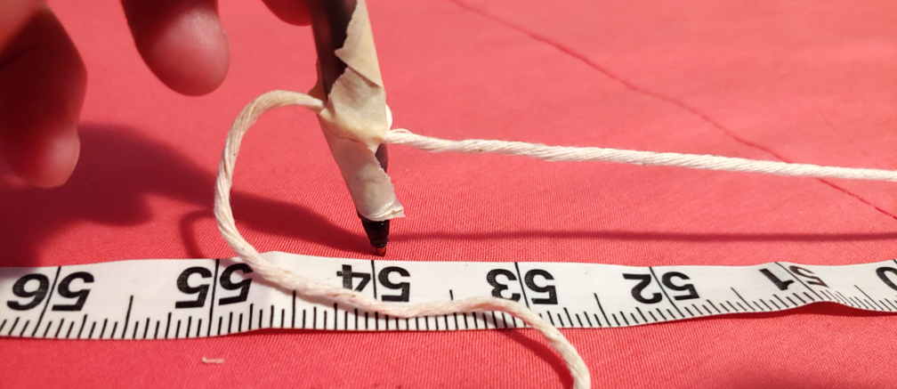 Twine is taped to the pen at 54", which was my back measurement.