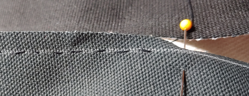 Straight stitch sewn along the marked seam line. The stitches are small and tight to ensure they withstand the tension of a boot
