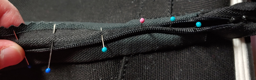 Left side pinned while the right side is already sewn