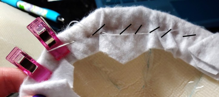 Whip stitches, marked in black. They're a little haphazard