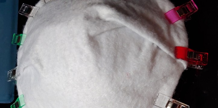 Dart added to the felt, held together by various colored clips. it's a little crooked, but it'll be covered up by the corset