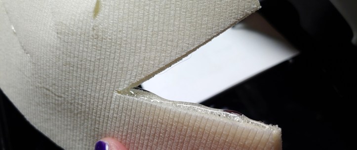 Adding glue to the cut seams. Just a bit will do.