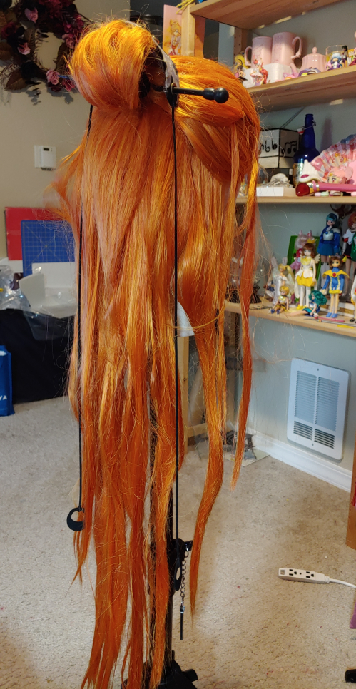 Distressed and matted long orange wig