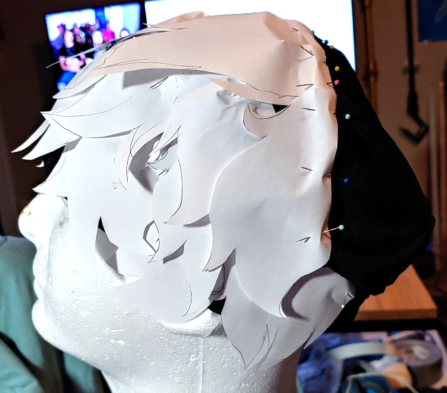 Final row of paper templates. The crown appears to be sitting back pretty far since the wig head has a very small forehead.