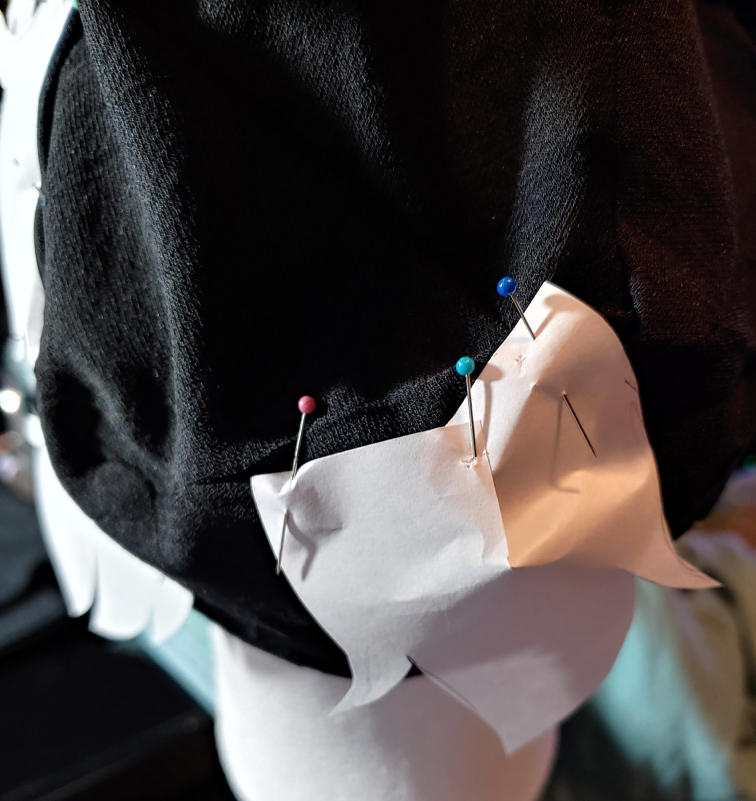 The middle row in the back pinned at the seam of the cap