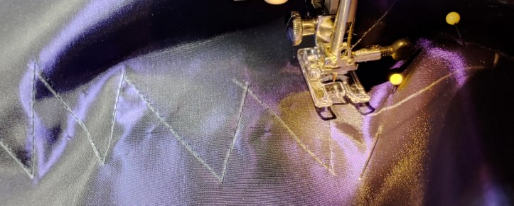 Sewing along the zigzag line to create the fancy edge