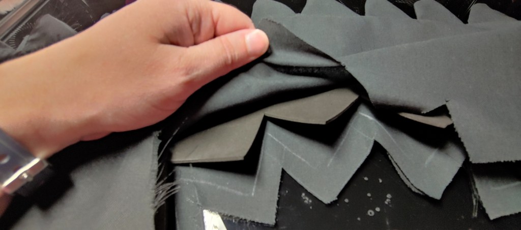 Foam and fabric sandwich. The foam is tucked inside the layers of fabric and nestled snugly inside.