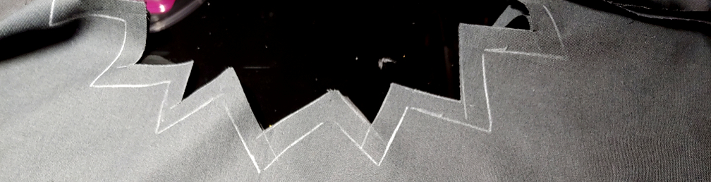 Seam allowance added and neckline trimmed. The original neckline marks appear in white beneath the cut edges.