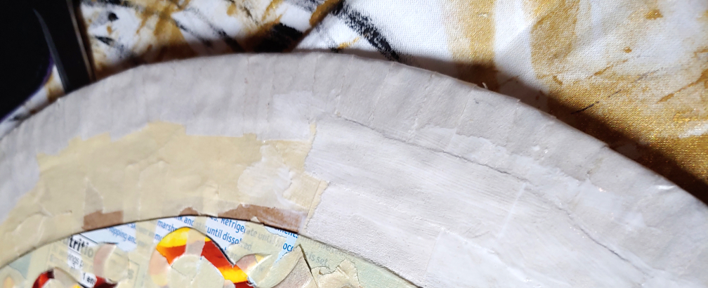 Strips running perpendicular to the blade strips. The perpendicular strips are partially glued to the right, overlapping the edge strips glued in previous steps.