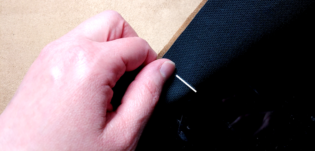 Top of the front marked along the back piece in white.