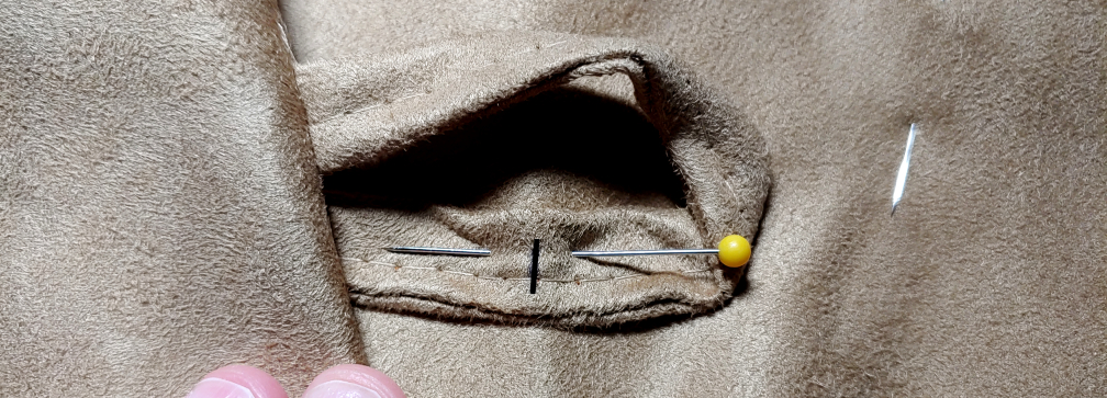 Fold marked in black with the pin turned to match the direction of the loop