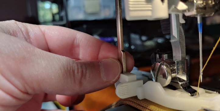 Pulling the sensor bar down to meet the foot