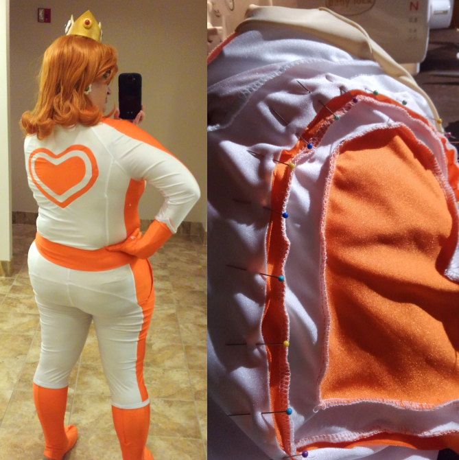 Princess Daisy's racing gear. A white bodysuit with orange racer stripes and belt with an orange and white heart on the back.