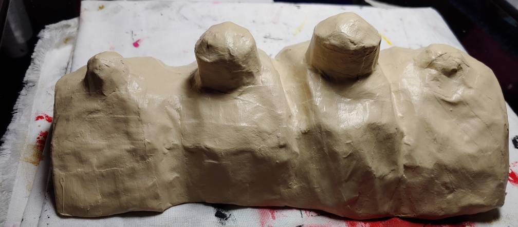 Bone painted beige. Some strips are slightly visible but most are sanded smooth