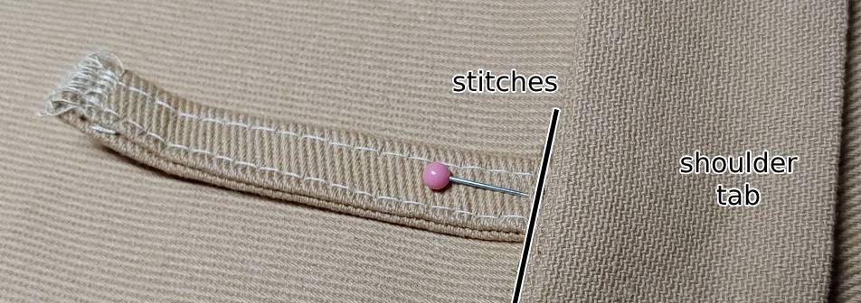 Carrier pinned and sewn. The stitches are pretty close to the edge of the shoulder tab