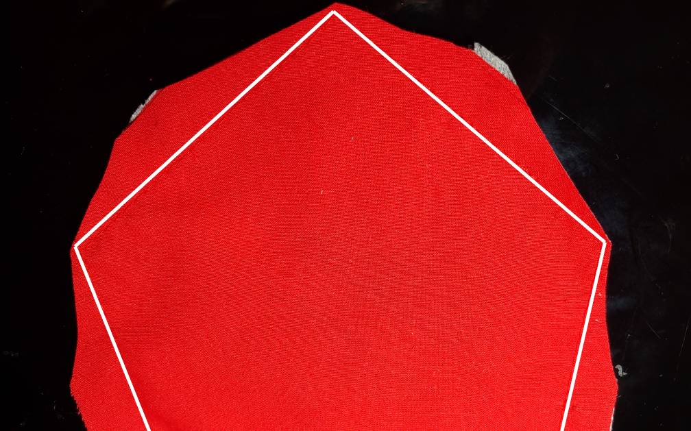 Tie stitched (stitches shown in white because my phone hates red) with the corners clipped