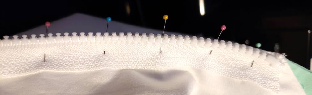 Pinning the zipper to the shirt