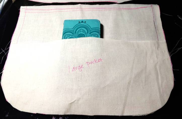 Testing out the large pocket size with my phone case tucked inside