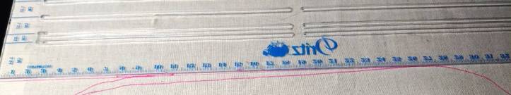 Straightening out the bottom edge with a ruler