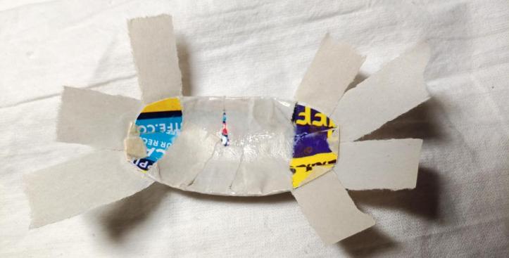 Wrapping the strips around the underside. I started with the middle strips