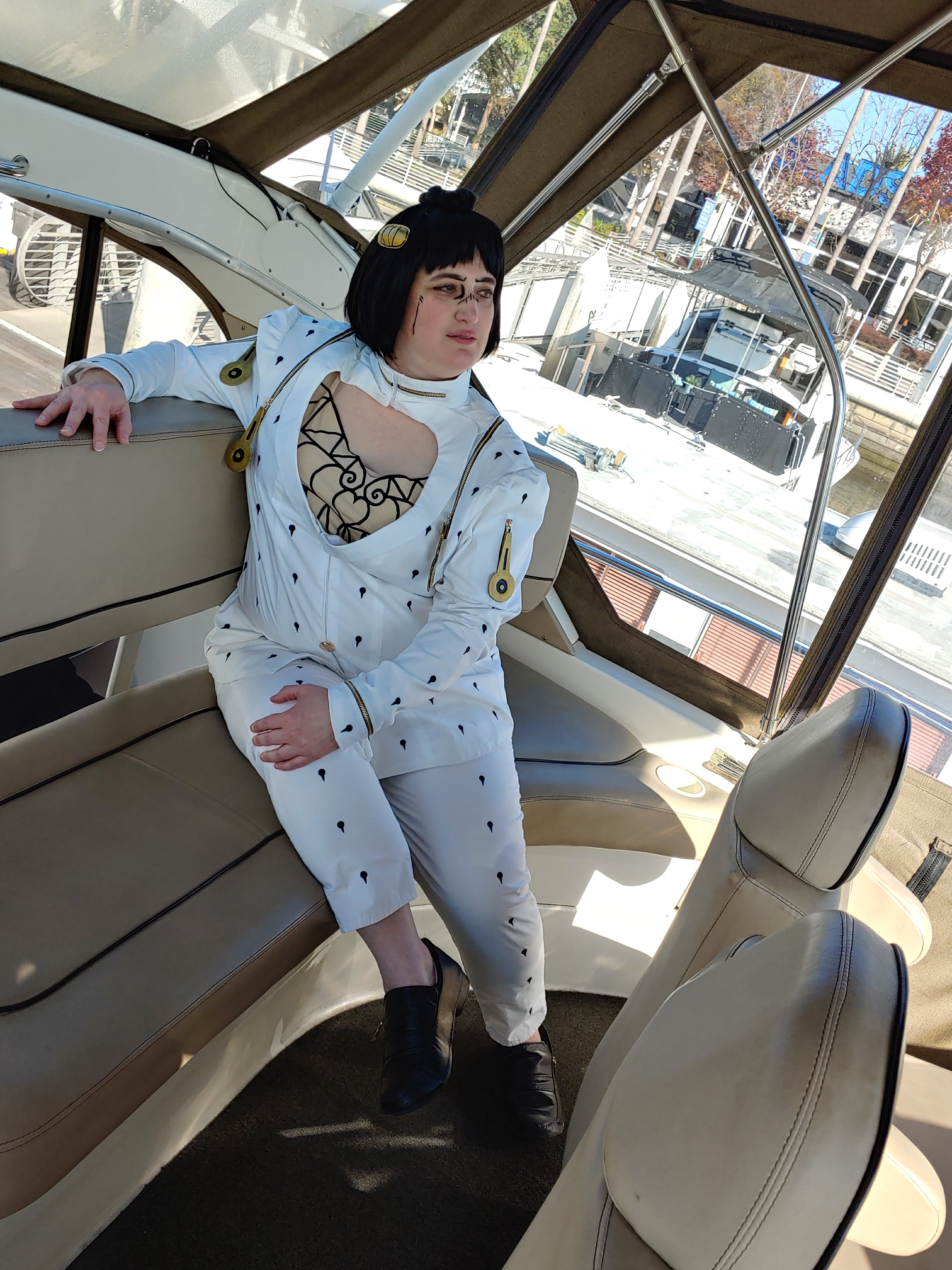 Bruno sitting in the cabin of a yacht