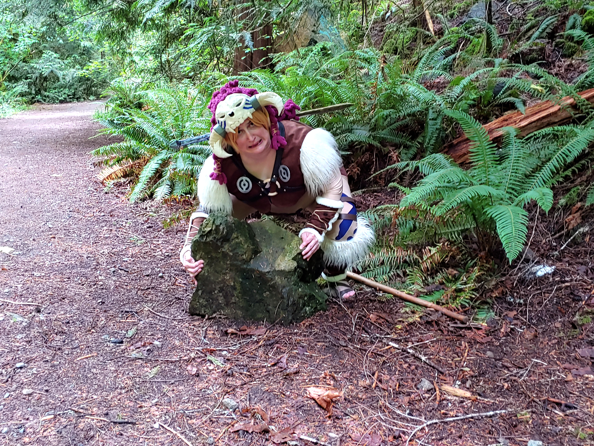 Link attempting to lift a very heavy rock