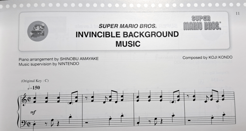 Title decorations of small circles across the top with a small image of Mario's sprite on the left and "Super Mario Bros" title on the right. Title says "Super Mario Bros. Invincible Background Music."