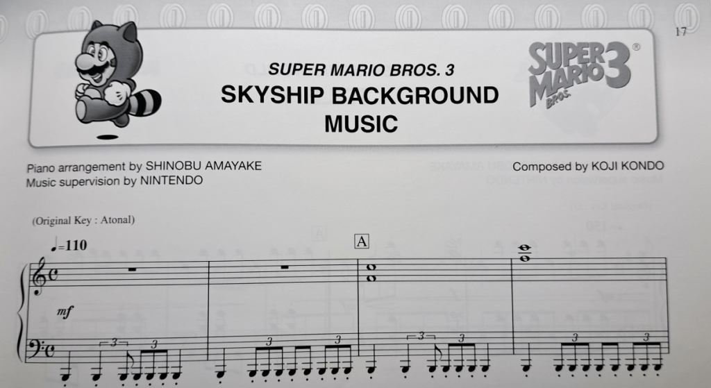 Title decorations. Border of Mario-style coins across the top. To the right of the title is "Super Mario Bros. 3". To the left is Tanuki Mario. Title says "Super Mario Bros. 3 Skyship Background Music."