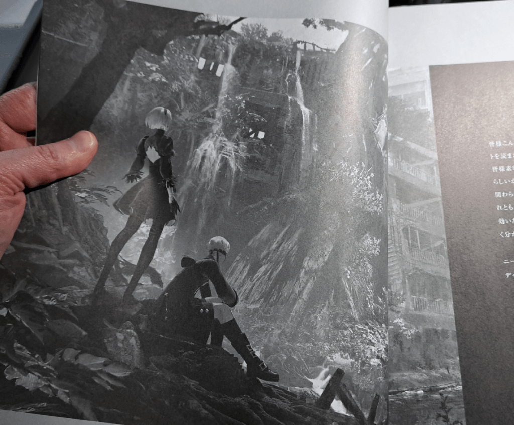 2B (left) and 9S (right) in front of waterfalls in the abandoned mall.